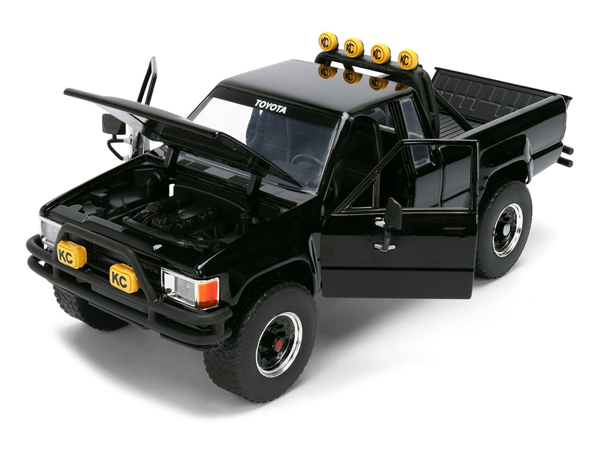 1985 Toyota SR5 Pickup Truck Black with Marty's Skateboard "Back to the Future" (1985) Movie "Hollywood Rides" Series 1/24 Diecast Model Car by Jada