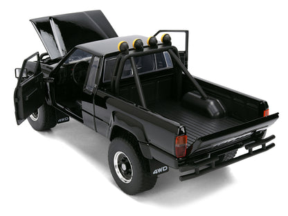 1985 Toyota SR5 Pickup Truck Black with Marty's Skateboard "Back to the Future" (1985) Movie "Hollywood Rides" Series 1/24 Diecast Model Car by Jada