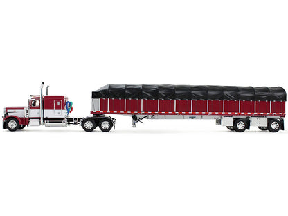 Peterbilt 389 with 63" Flat Top Sleeper and 53' Wilson Roadbrute Flatbed Trailer with Covered Wagon Maroon with White Stripes 1/64 Diecast Model by DCP/First Gear