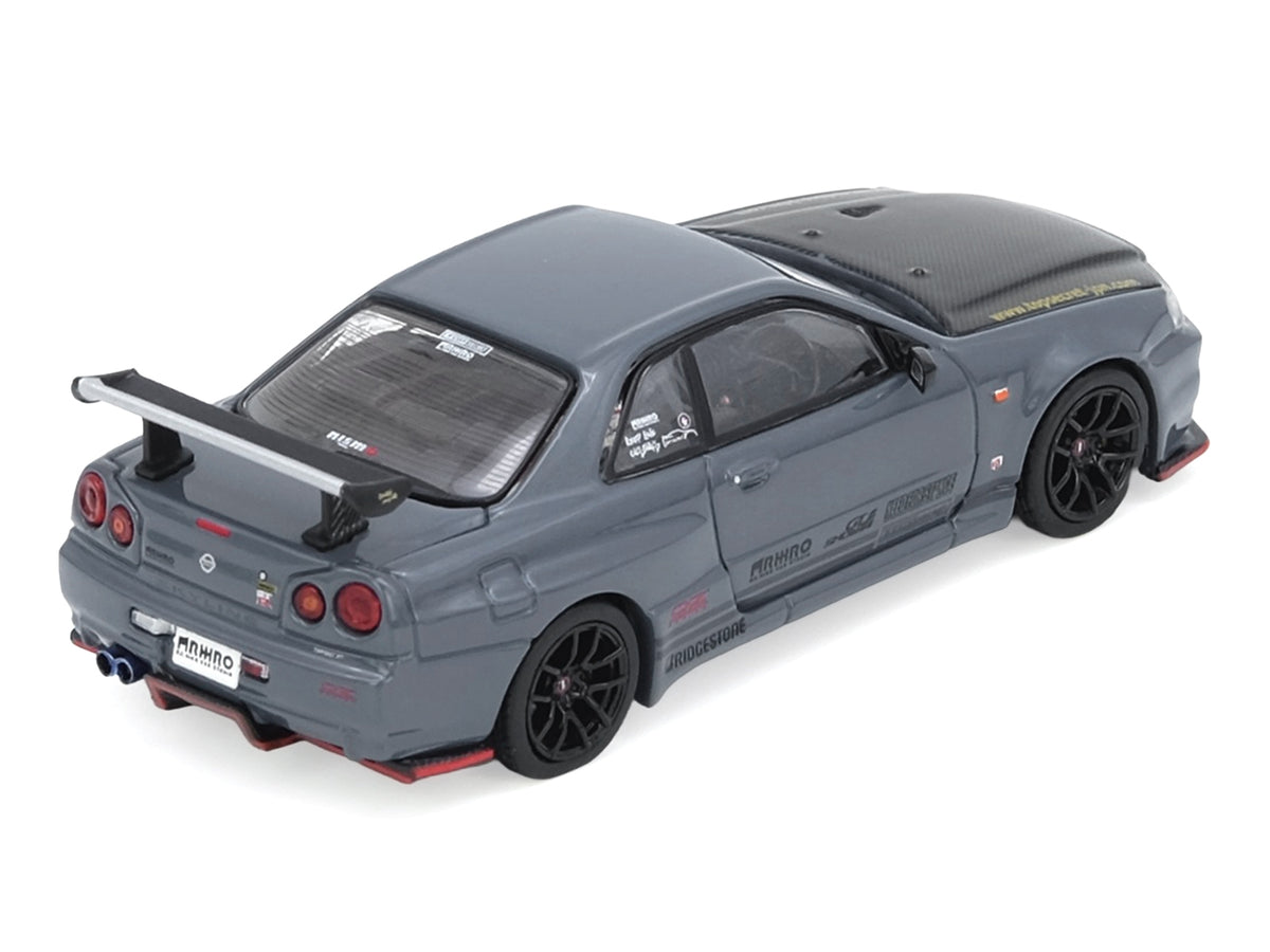 Nissan Skyline GT-R (R34) "Top Secret" RHD (Right Hand Drive) Stealth Gray with Carbon Hood "GTSHOW 2025 Event Edition" 1/64 Diecast Model Car by Inno Models