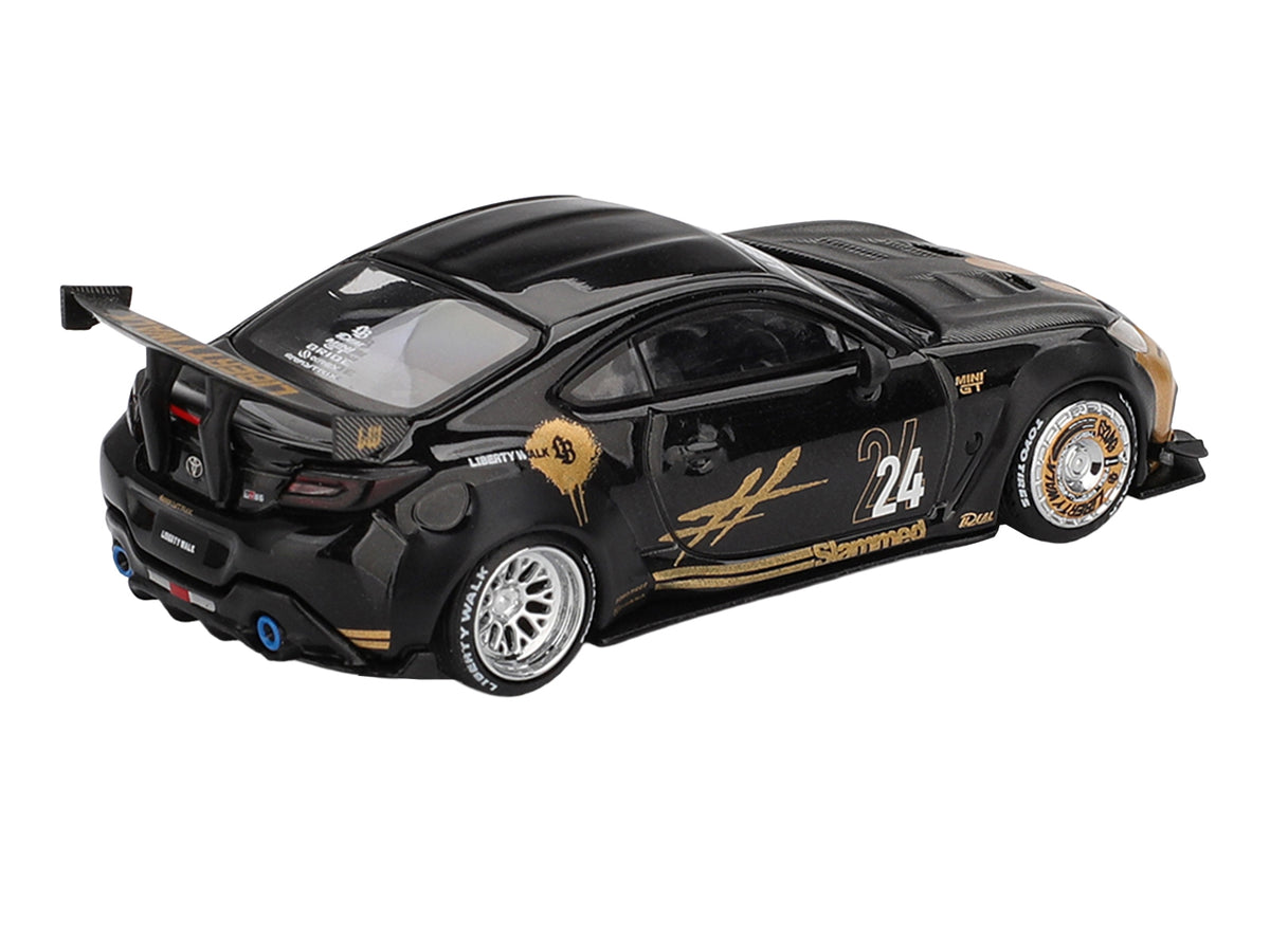Toyota GR86 "LB-Nation - Liberty Walk" #24 Black with Carbon Hood and Gold Graphics Limited Edition 1/64 Diecast Model Car by Mini GT