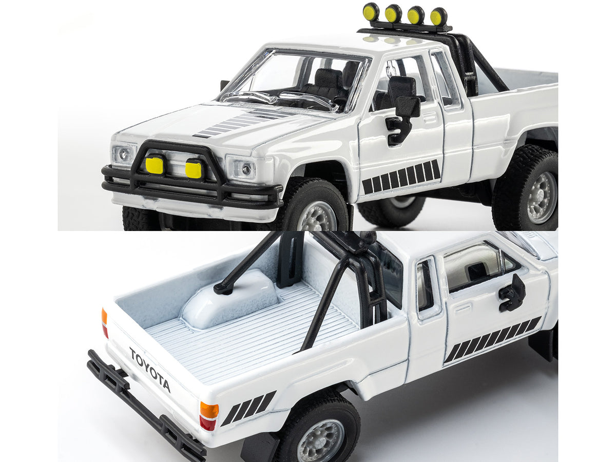 1985 Toyota Hilux SR5 Pickup Truck White with Black Graphics "Collection" Series 1/64 Diecast Model Car by Majorette