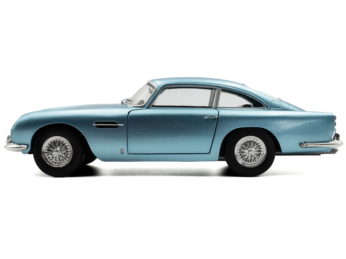 1964 Aston Martin DB5 RHD (Right Hand Drive) Light Blue Metallic 1/18 Diecast Model Car by Solido